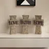 Homezia Set Of Three 11" Gray Resin Cross Figurine