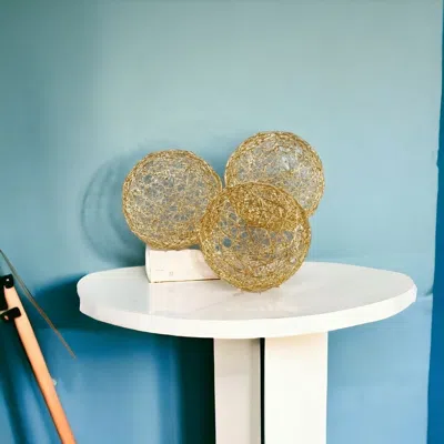Homezia Set Of Three Gold Metal 3" Decorative Orbs