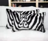 Homezia Set Of Two 12" X 20" Black And White Faux Fur Throw Pillow