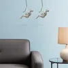 Homezia Set Of Two 6" Silver Unique Climbing Man With Rope Wall Art