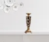 Homezia Set Of Two Brown And Gold Pillar Tabletop Pillar Candle Holders