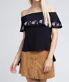 Honey Punch Strapless Embroidered Ruffle Top In Black