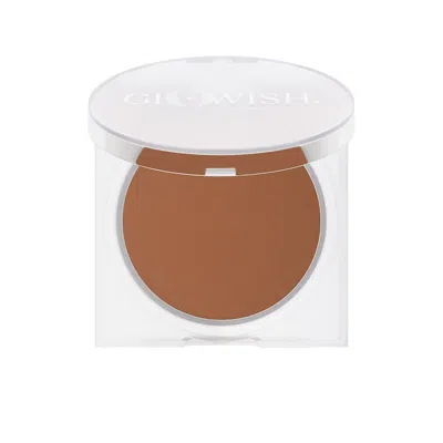 Huda Beauty Glowish Luminous Pressed Powder In Deep In 11 Deep