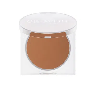 Huda Beauty Glowish Luminous Pressed Powder In Extra Tan In 09 Extra Tan
