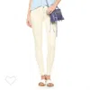Hudson Nico Mellow Mid Rise Super Skinny Stretch Skinny Jeans In Light Yellow In Yellow