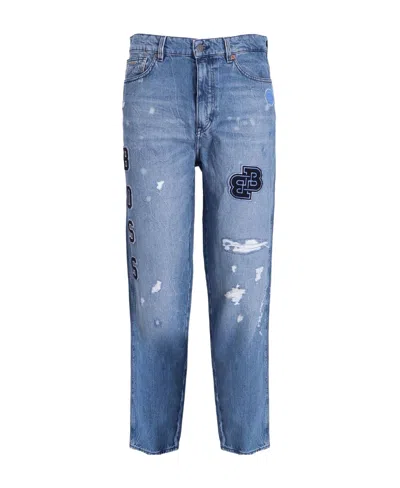 Hugo Boss All-over Logo Patch Jeans In Blue