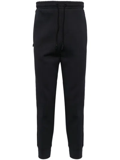 Hugo Boss Artwork-embossed Track Pants In Blue