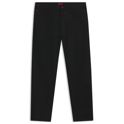 HUGO BOSS BLACK TAPERED-FIT JEANS IN JAPANESE DENIM