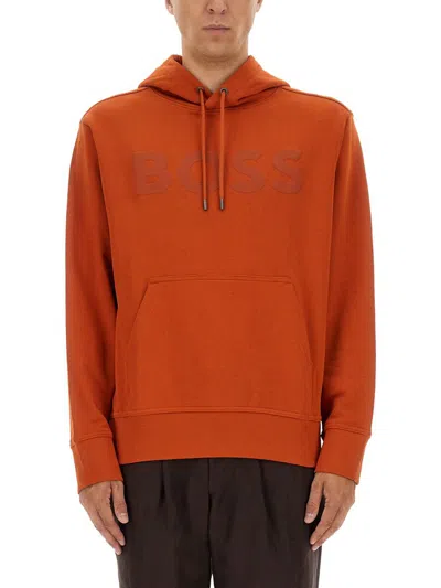 Hugo Boss Embossed-logo Hoodie In Orange