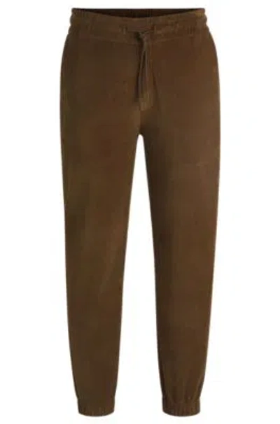 Hugo Boss Boss Selected By Beckham Stretch-corduroy Tracksuit Bottoms In Light Green
