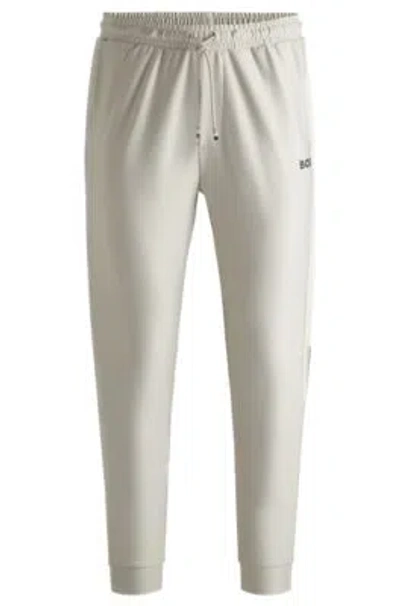 Hugo Boss Boss X Matteo Berrettini Tracksuit Bottoms With Contrast Tape And Branding In Light Beige