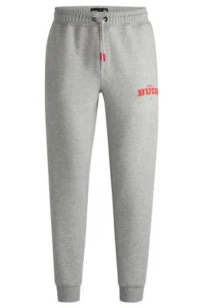 HUGO BOSS BOSS X NFL SIGNATURE-TAPE TRACKSUIT BOTTOMS WITH SPECIAL BRANDING