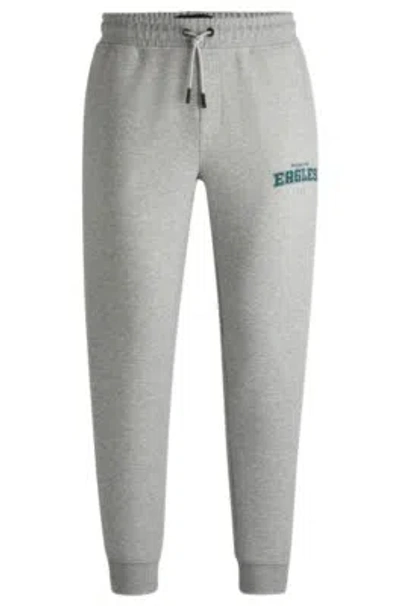 HUGO BOSS BOSS X NFL SIGNATURE-TAPE TRACKSUIT BOTTOMS WITH SPECIAL BRANDING