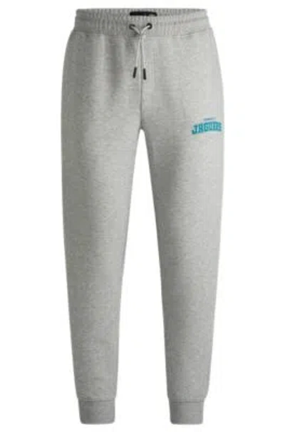Hugo Boss Boss X Nfl Signature-tape Tracksuit Bottoms With Special Branding In Jaguars