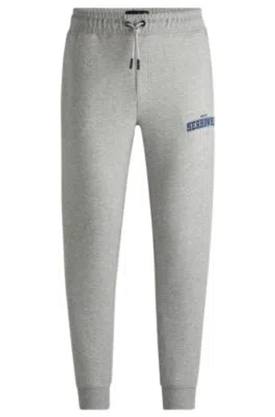 Hugo Boss Boss X Nfl Signature-tape Tracksuit Bottoms With Special Branding In Seahawks