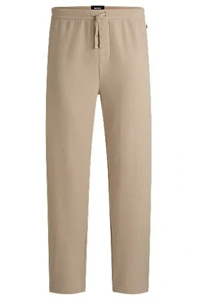 Hugo Boss Cotton-blend Pyjama Bottoms With Embroidered Logo In Gold
