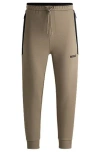 Hugo Boss Tracksuit Bottoms With 3d-molded Logo In Light Green