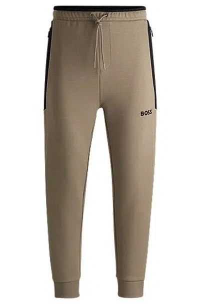 Hugo Boss Tracksuit Bottoms With 3d-molded Logo In Light Green