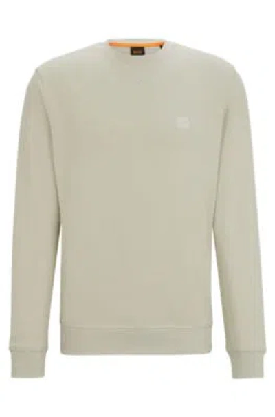 Hugo Boss Cotton-terry Relaxed-fit Sweatshirt With Logo Patch In Light Beige