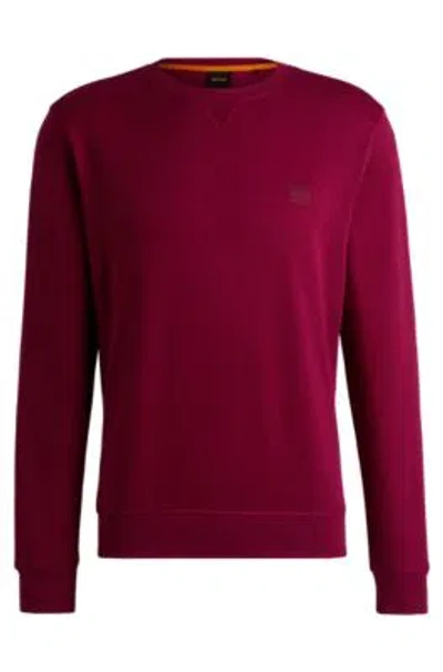 Hugo Boss Cotton-terry Relaxed-fit Sweatshirt With Logo Patch In Light Red