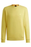 Hugo Boss Cotton-terry Relaxed-fit Sweatshirt With Logo Patch In Yellow