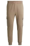 Hugo Boss Cotton-terry Tracksuit Bottoms With Cargo Pockets In Brown