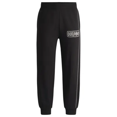 Hugo Boss Cotton-terry Tracksuit Bottoms With Chain-stitch Logo In Black