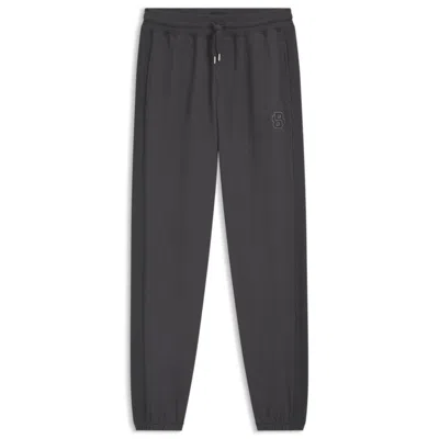 Hugo Boss Cotton-terry Tracksuit Bottoms With Double B Monogram In Gray