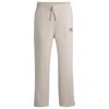 Hugo Boss Cotton-terry Tracksuit Bottoms With Embroidered Graphics In White