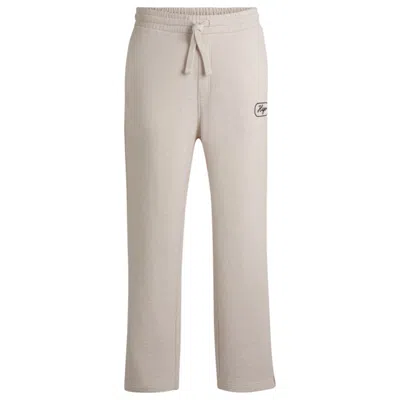 Hugo Boss Cotton-terry Tracksuit Bottoms With Embroidered Graphics In White
