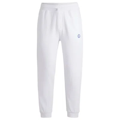 Hugo Boss Cotton-terry Tracksuit Bottoms With Happy Hugo Logo Patch In White