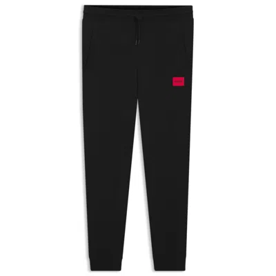 Hugo Boss Cotton-terry Tracksuit Bottoms With Logo Label In Blue