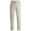 Hugo Boss Cotton-terry Tracksuit Bottoms With Logo Patch In Light Beige