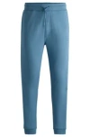 Hugo Boss Cotton-terry Tracksuit Bottoms With Logo Patch In Light Blue