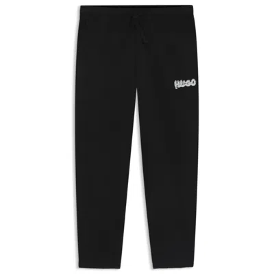 HUGO BOSS COTTON-TERRY TRACKSUIT BOTTOMS WITH LOGO PRINT