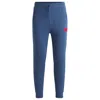 Hugo Boss Cotton-terry Tracksuit Bottoms With Red Logo Label In Blue