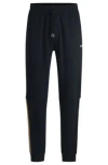Hugo Boss Cotton-terry Tracksuit Bottoms With Tape Inserts In Dark Blue