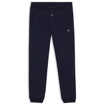 Hugo Boss Cotton Tracksuit Bottoms With Stacked Logo In Blue