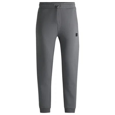 Hugo Boss Cotton Tracksuit Bottoms With Stacked Logo In Grey