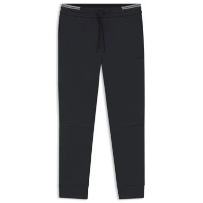 Hugo Boss Cotton Tracksuit Bottoms With Striped Trims In Black