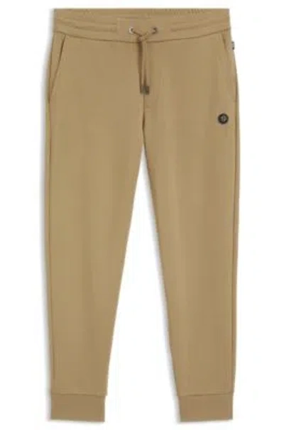 Hugo Boss Cotton-blend Sweatpants With Double B Monogram In Brown