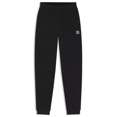 Hugo Boss Cotton-terry Sweatpants With Embroidered Logo In Black