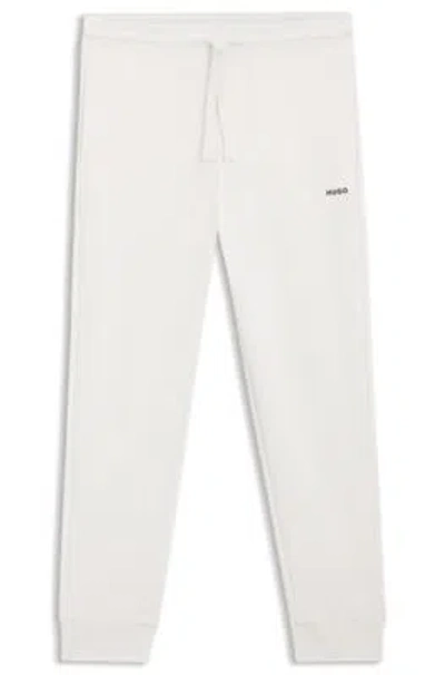 Hugo Boss Cuffed Sweatpants In Cotton Terry With Logo Print In White