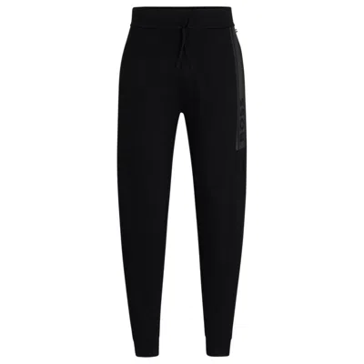 Hugo Boss Cuffed Tracksuit Bottoms In French Terry With Logo Print In Black