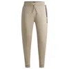 Hugo Boss Drawcord Tracksuit Bottoms In Cotton Terry With Logo Print In Beige