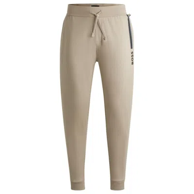 Hugo Boss Drawcord Tracksuit Bottoms In Cotton Terry With Logo Print In Beige