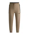 Hugo Boss Tracksuit Bottoms With 3d-molded Logo In Brown