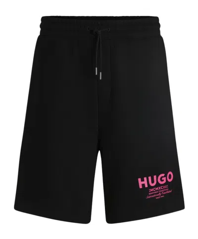 HUGO BOSS LOGO-PRINT TRACK SHORTS