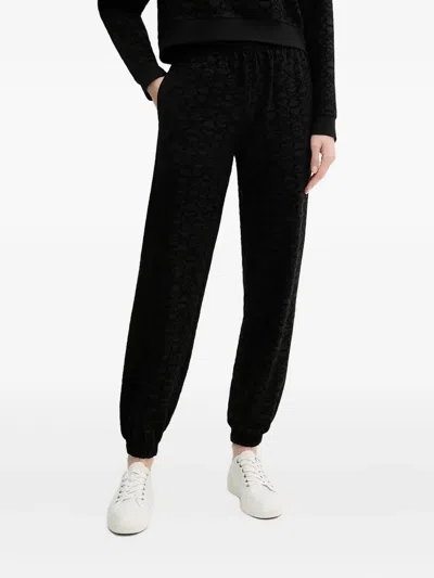 Hugo Boss Embossed-cuffed Joggers In Black