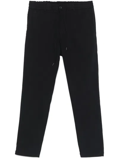 Hugo Boss Logo-embroidered Trousers In Black